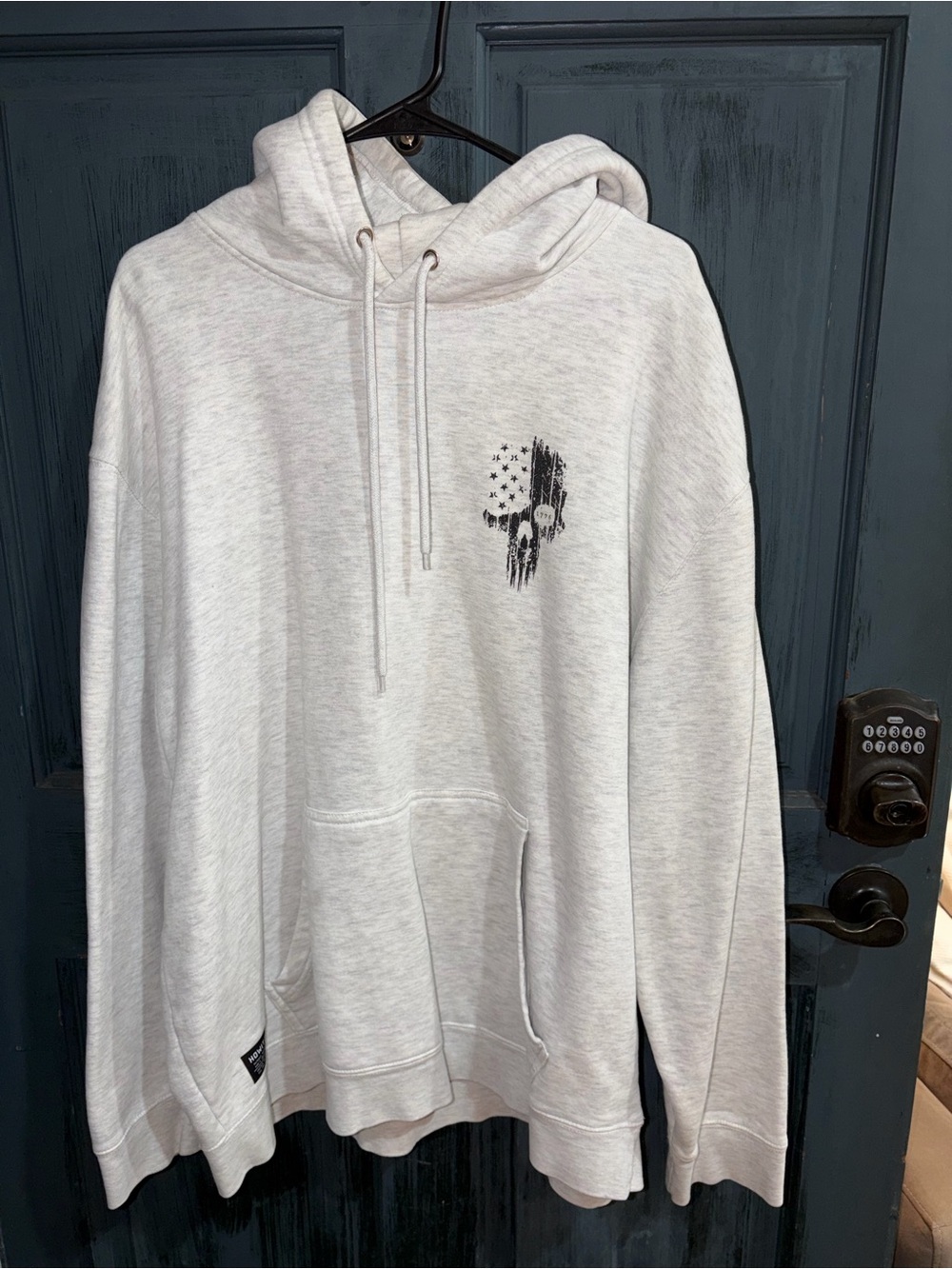 Light Gray Hooded Pullover Sweatshirt with Skull Flag Graphic